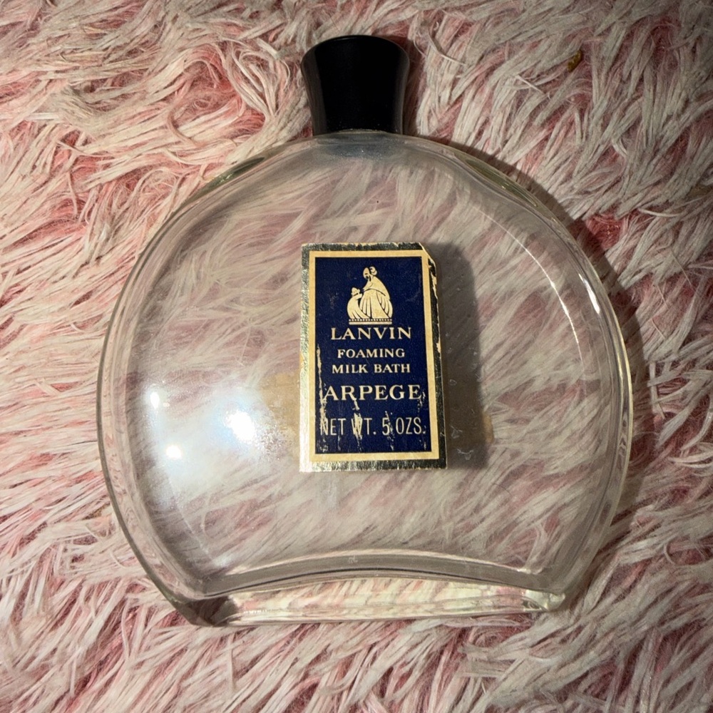 A Rare Lanvin Clear Foaming Milk Bath Bottle with Navy and Gold Label